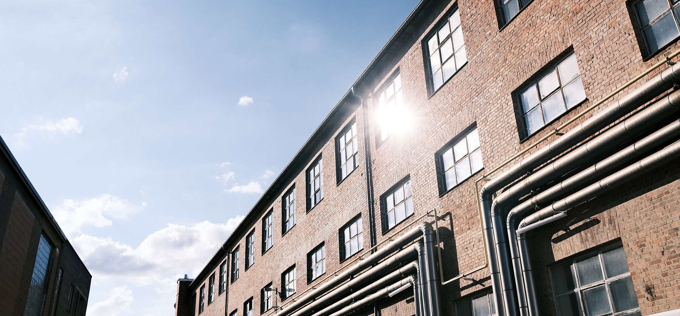 Außenaufnahme eines historischen Firmengebäudes im Böhringer Areal